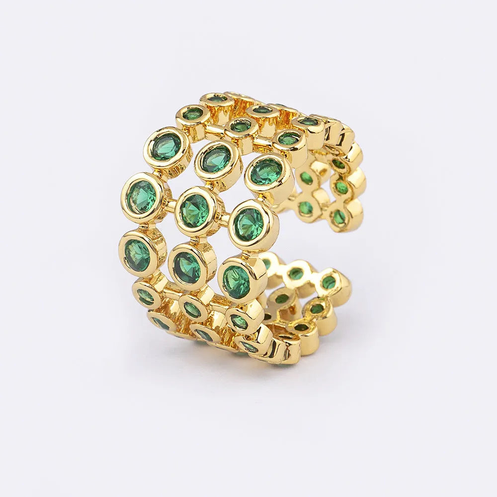 Wide copper ring with green zircon stones and gold plating