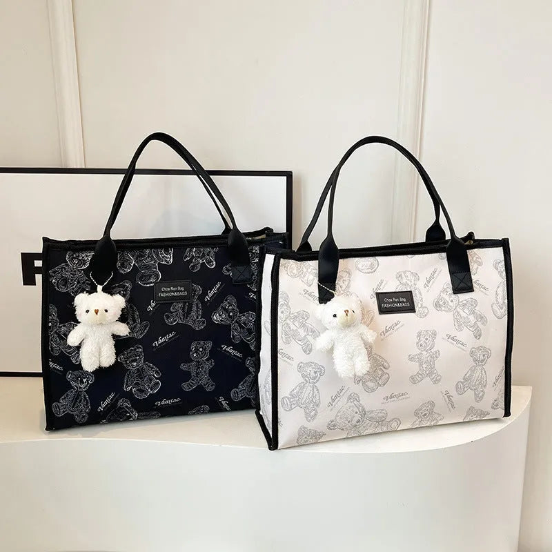 Women's black canvas tote bag with rhombus pattern print and large capacity design