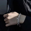 Men's titanium steel bracelet with geometric design featuring cross detail and cold wind styling