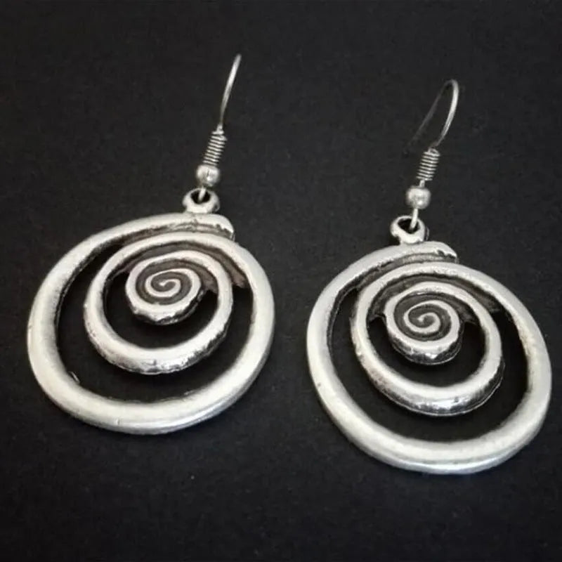 Silver geometric spiral distressed earrings with national style design measuring 2.6x5cm
