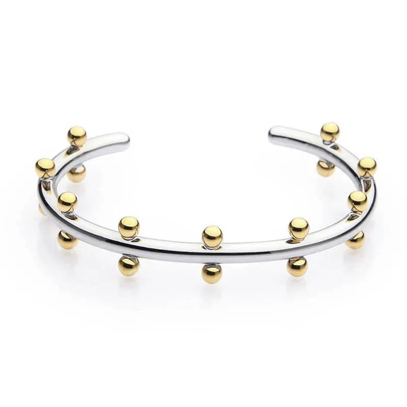 C-shaped textured rivet bean bead charm bracelet in gold, steel, or two-tone finish on an alloy chain.