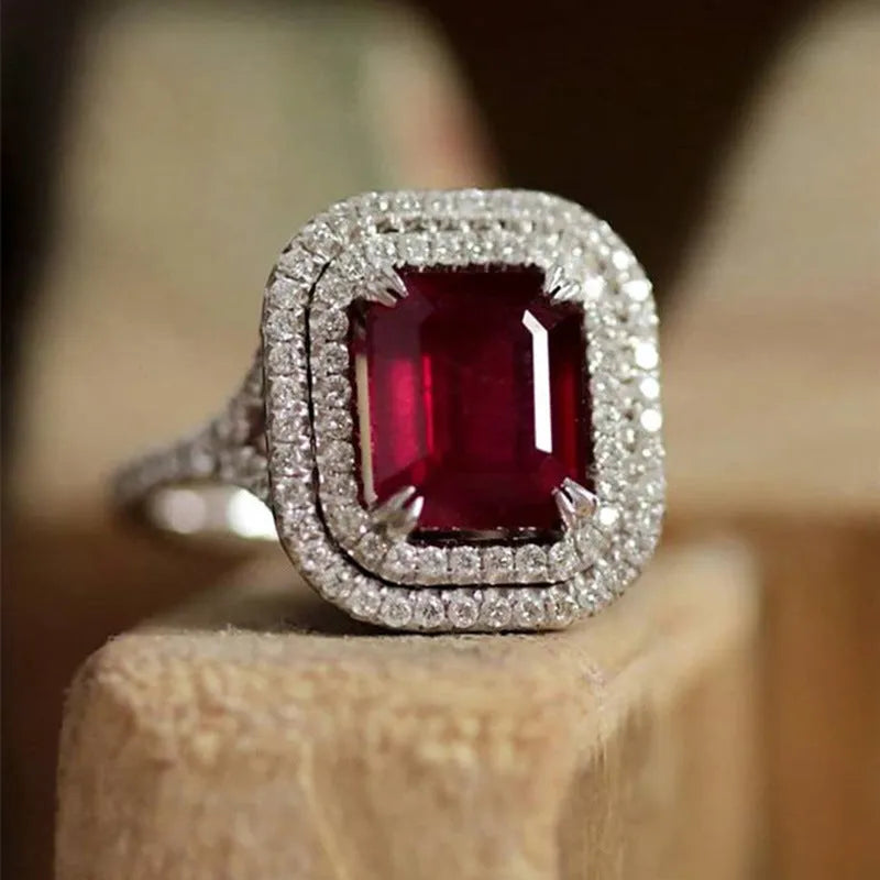 Copper square ring with red rhinestones in geometric princess cut design