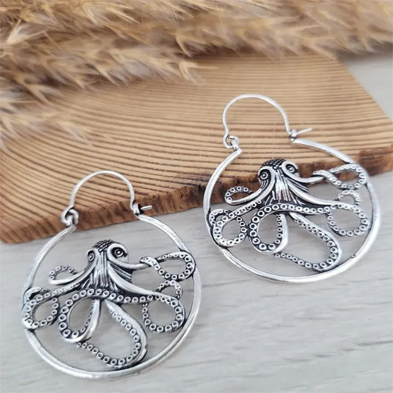Vintage octopus earrings with antique silver electroplated finish and detailed animal modelling