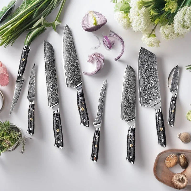 Eight-piece Damascus steel kitchen knife set showing fishbone pattern and different blade sizes