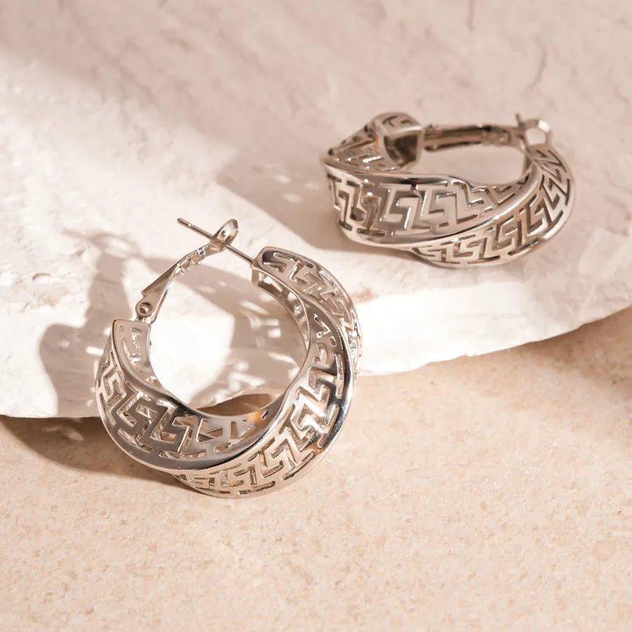 Women's geometric twisted round hollow stud earrings in silver needle-gold or silver needle-silver finish