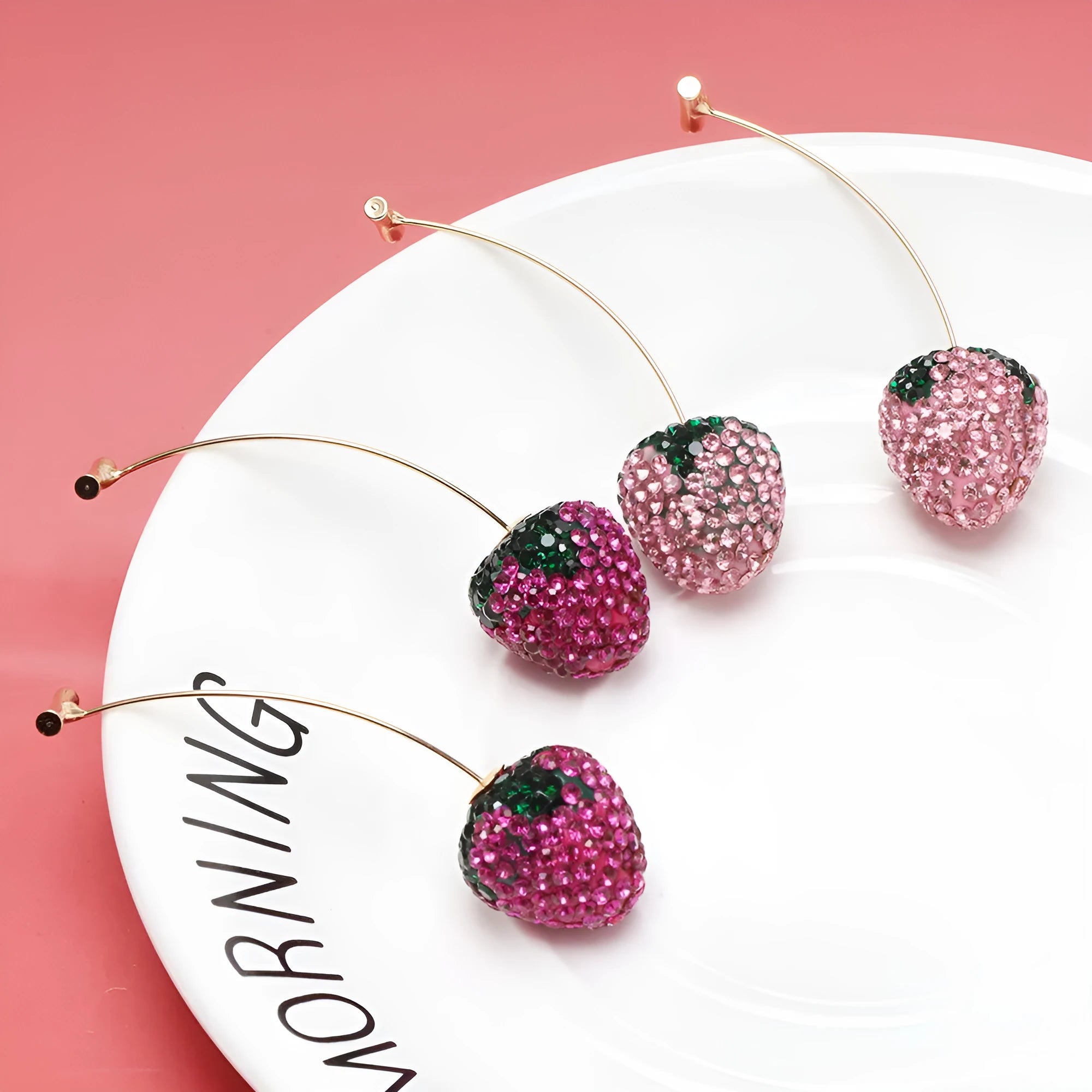 Geometric strawberry earrings with spot drill pattern in multiple colours