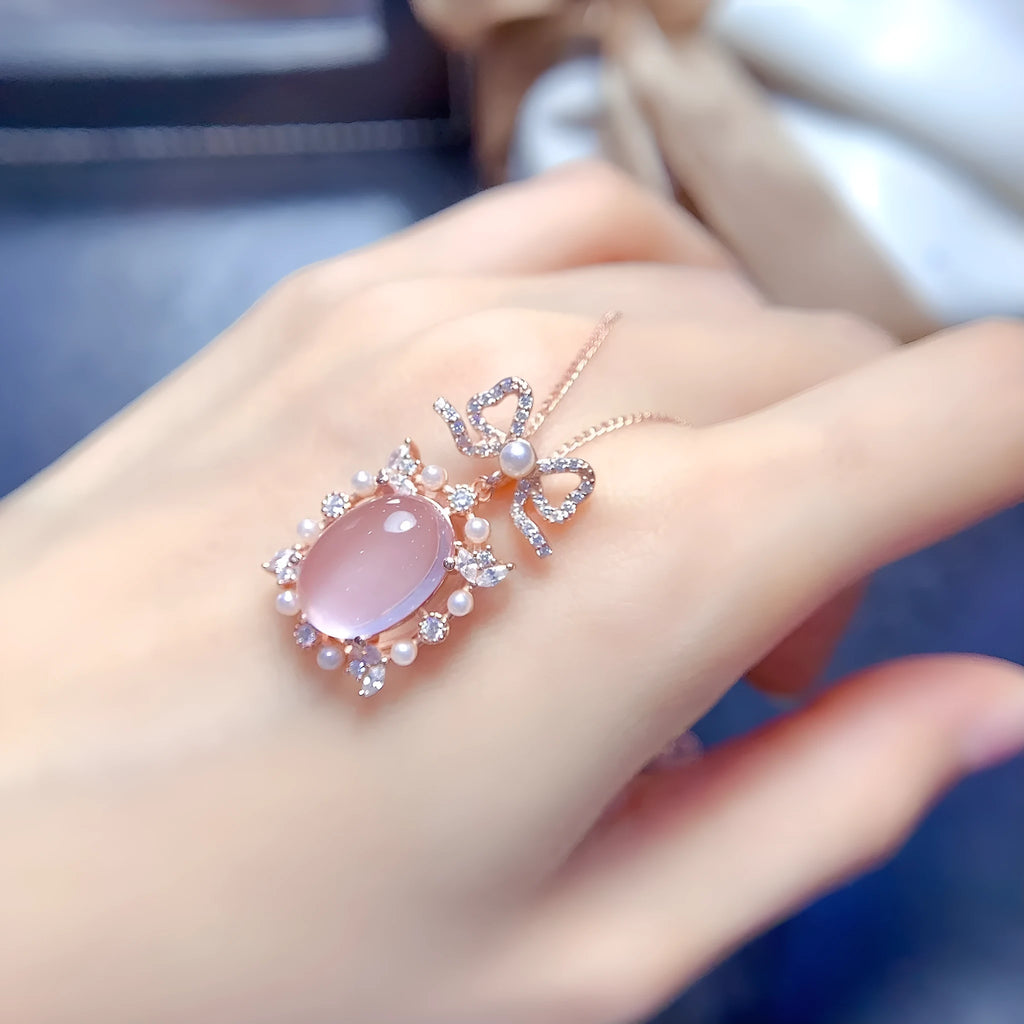 Geometric rose quartz pendant necklace in rose gold plated silver on a chain