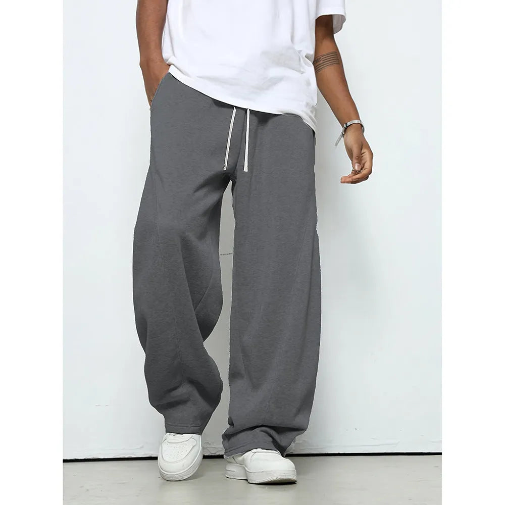 Men's solid colour casual trousers with an elastic waistband and straight leg in a grey shade.