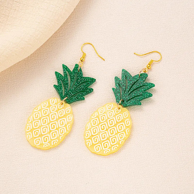 Acrylic drop earrings with a carved coconut and jackfruit design on a metal hook, shown in multiple colour variants.