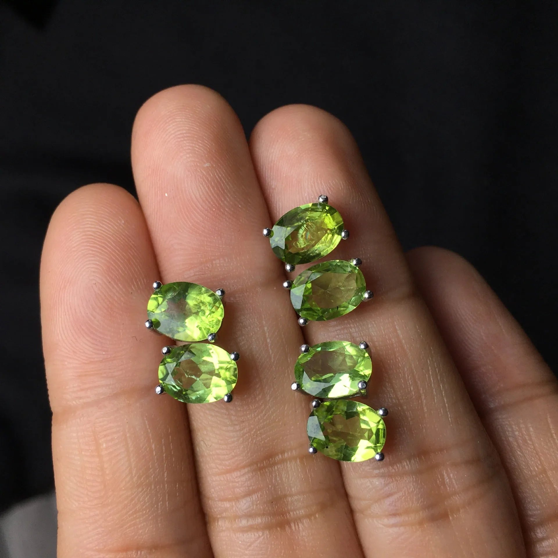 Natural grass green olivine stud earrings in S925 sterling silver with 6x8mm oval stones.