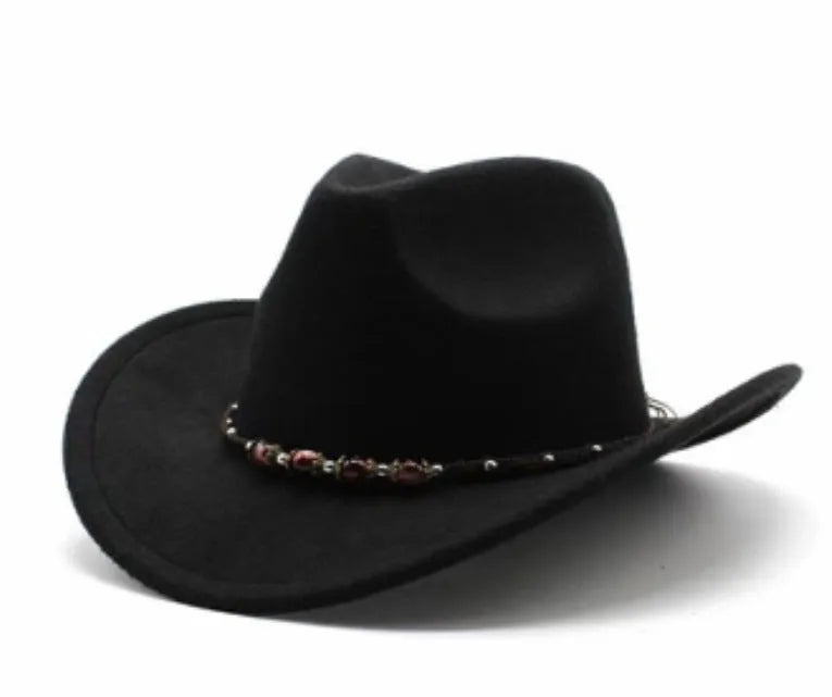 Brown leather velvet cowboy hat with a curved edge and conical crown on a plain background.