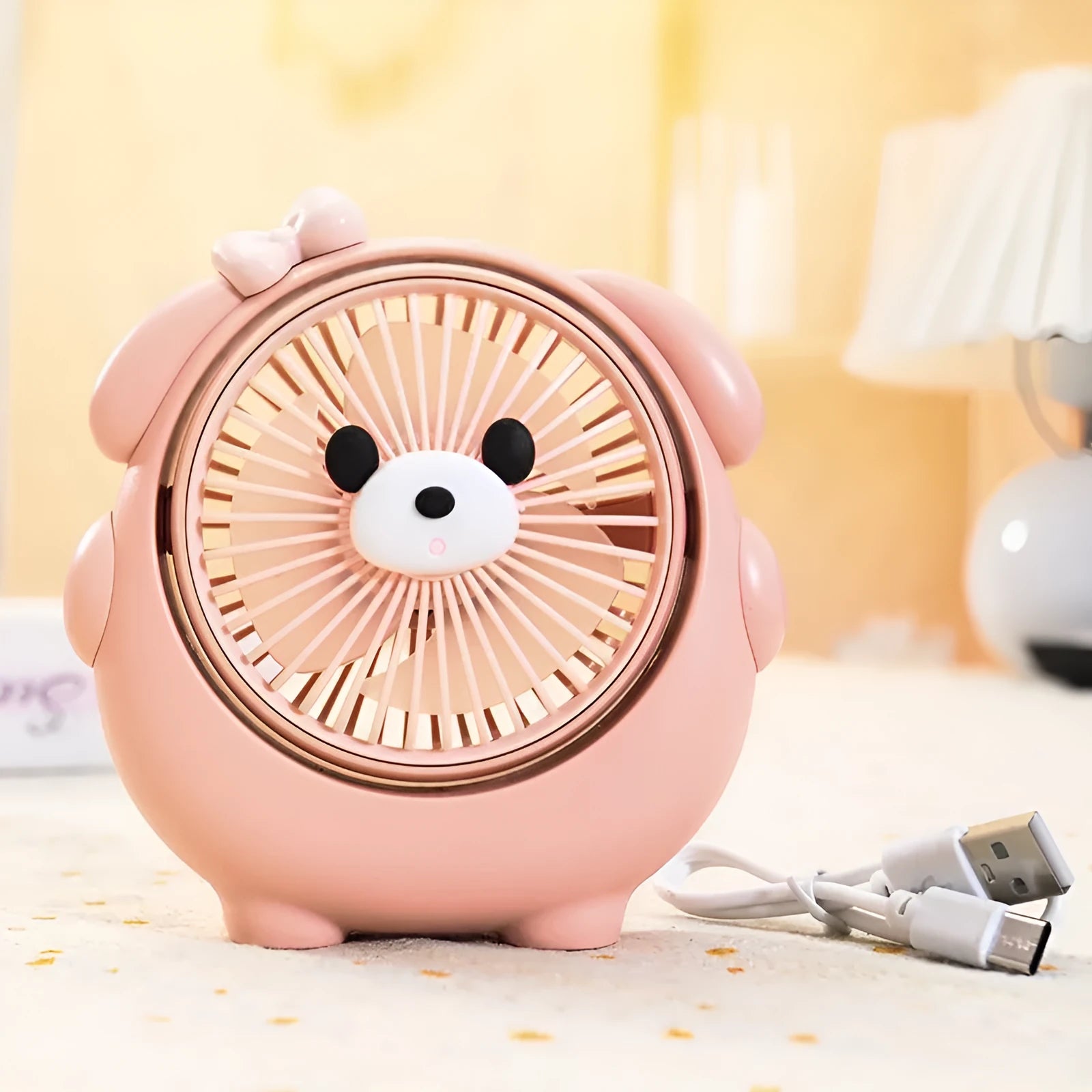 Cute dog-themed USB desk fan for pets with three speed settings on a desktop