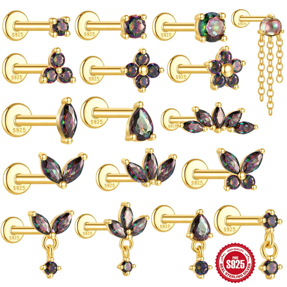S925 sterling silver flat head thread piercing with a shiny rainbow stone in a gold setting.