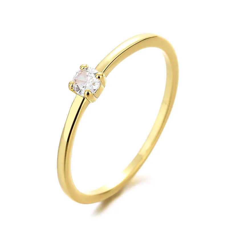 Women's personalised copper fine circle ring with single diamond geometric design in four colour options
