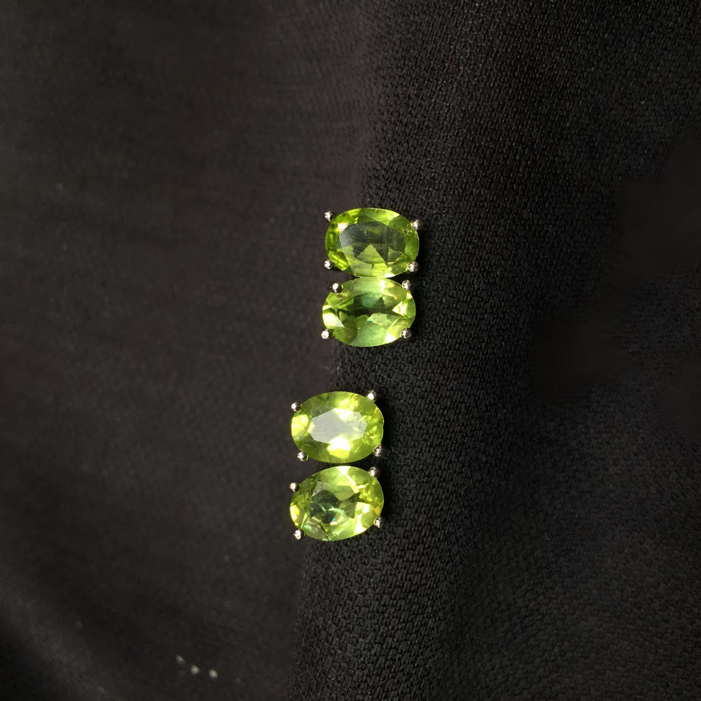 Natural grass green olivine stud earrings in S925 sterling silver with 6x8mm oval stones.