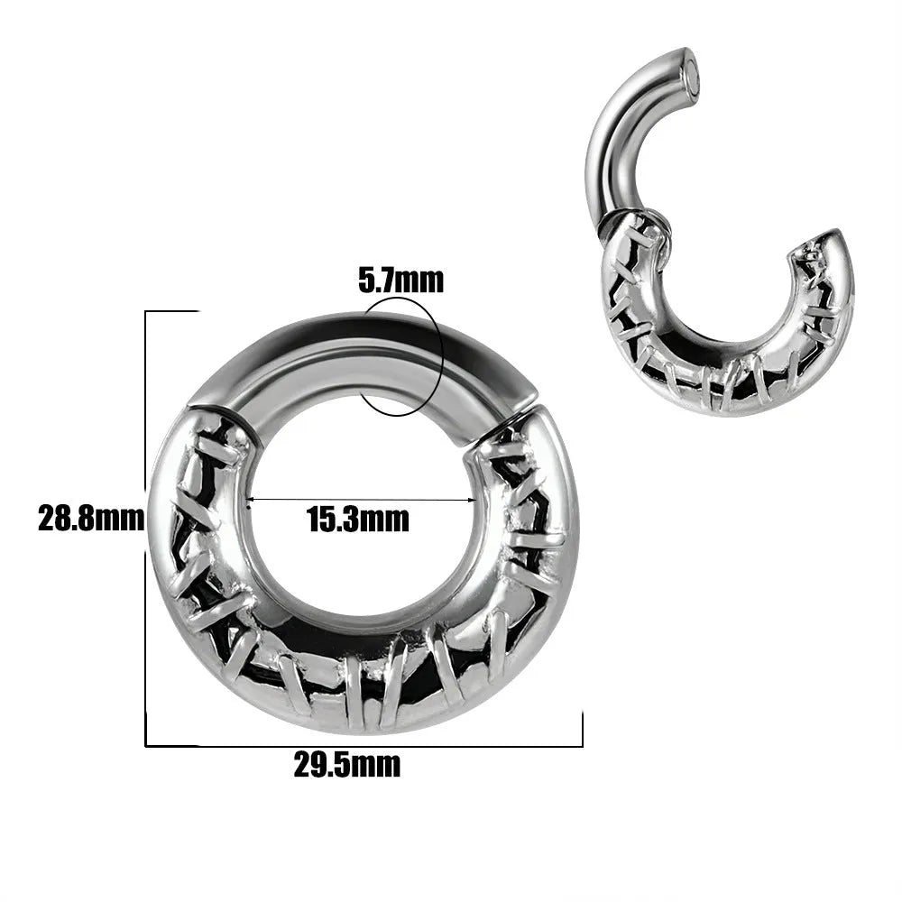 A pair of silver-toned fashion earrings with a geometric totem pattern design on a white background.