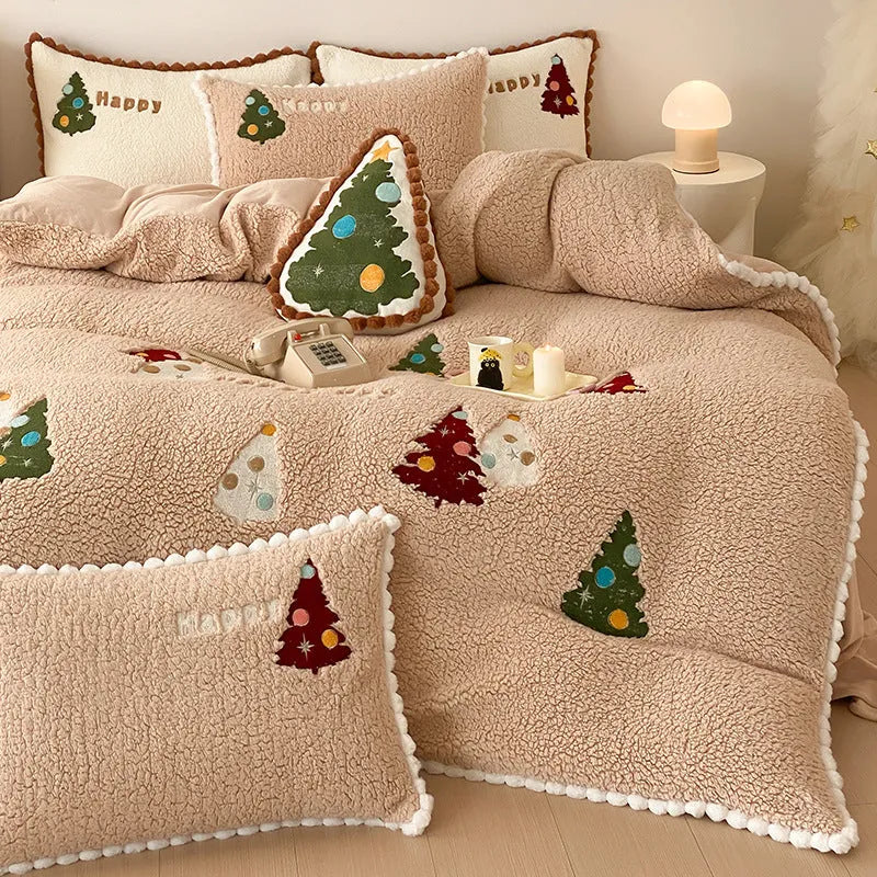Bright yellow fleece-lined four-piece bedding set with a cartoon winter Christmas tree pattern.