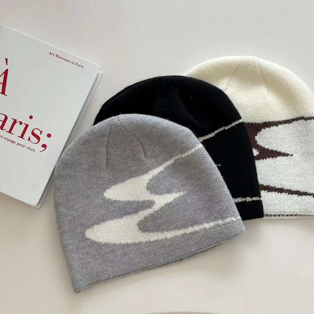 Acrylic thermal beanie hat in black, grey, or white colours for autumn and winter wear