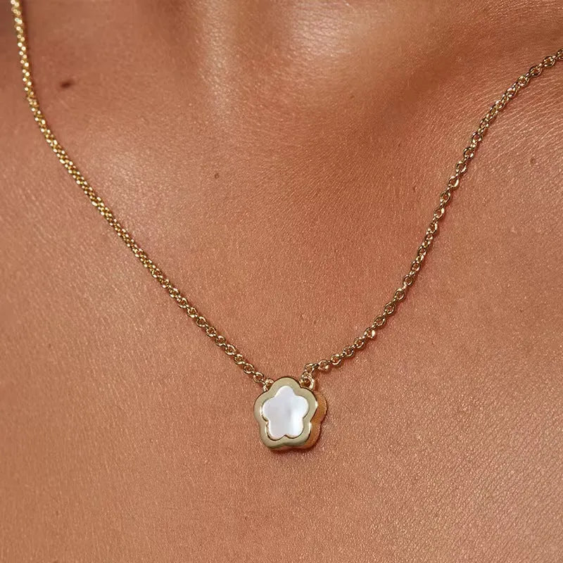 Women's flower necklace with white mother shell pendant on copper chain in gold and silver tones