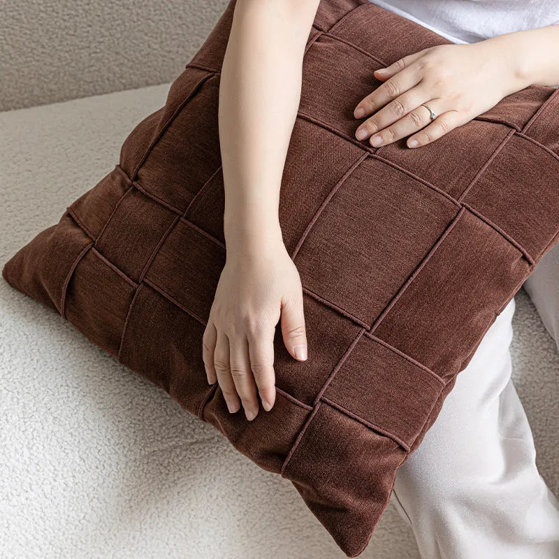 Square 50x50cm chenille woven pillow cushion on a sofa in a choice of seven colours.