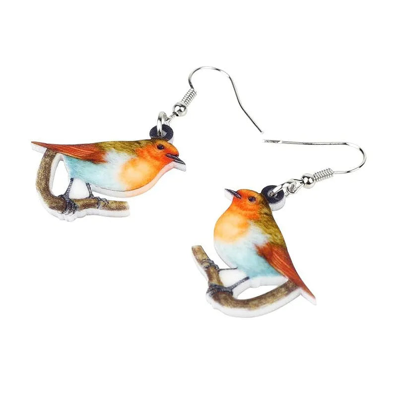 A pair of women's acrylic pendant earrings with a detailed Blue Titmouse bird design in a geometric style.