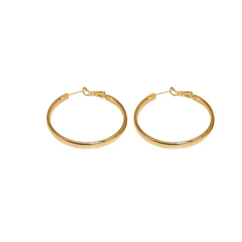 Circular 40mm diameter metal earrings with gold or silver electroplated finish