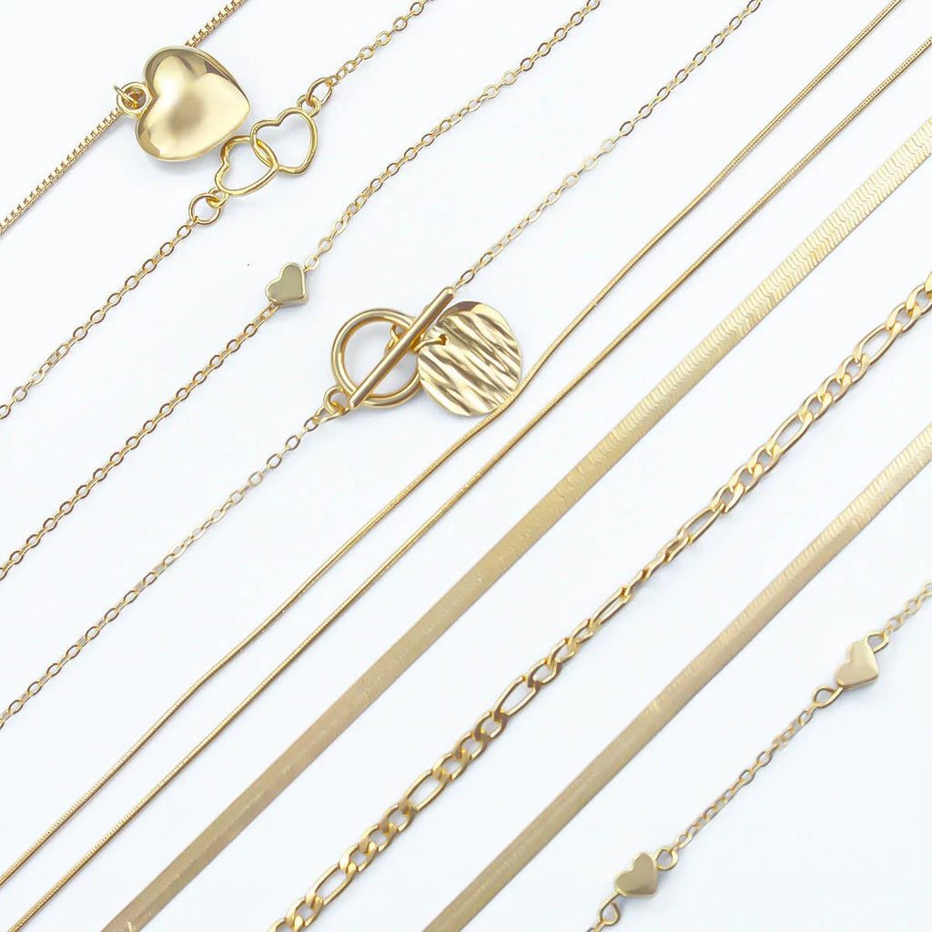 10-piece gold electroplated women's necklace set with adjustable length and snake bone chain design