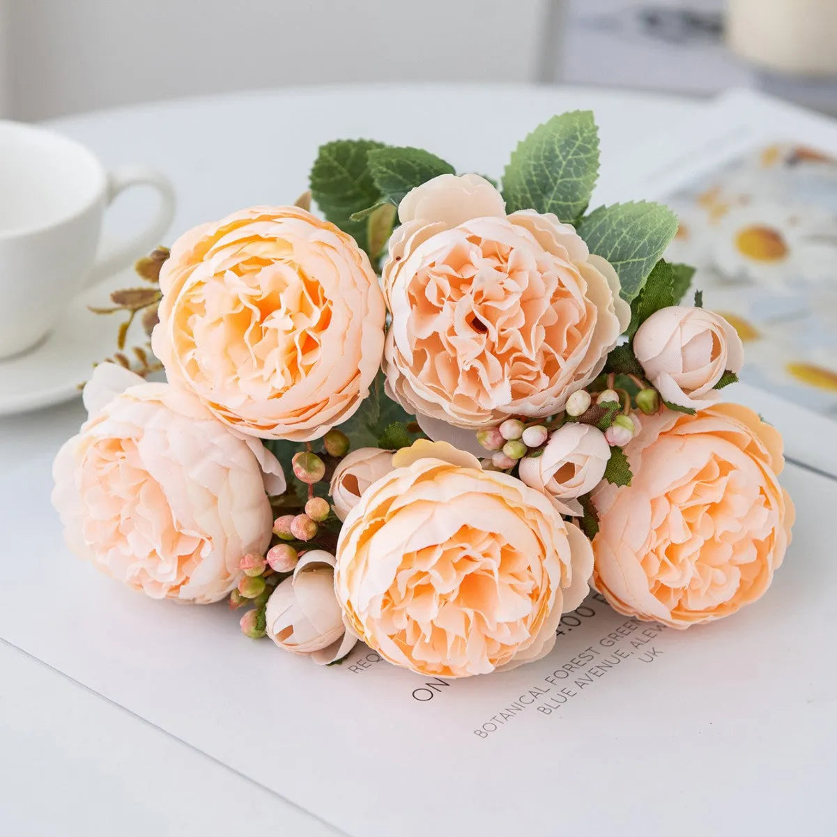 Artificial silk peony flower bouquet in champagne and sand red colours for home decor.