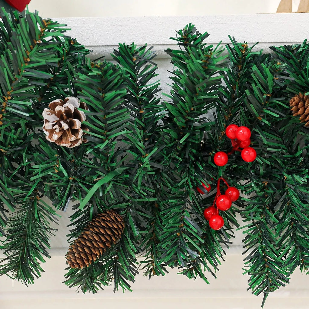 Christmas rattan decoration with PVC pine cone bow, available with optional LED lighting in warm white or coloured variants.