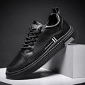 Men's low-top skateboard shoes with elastic band and microfiber upper in white or black