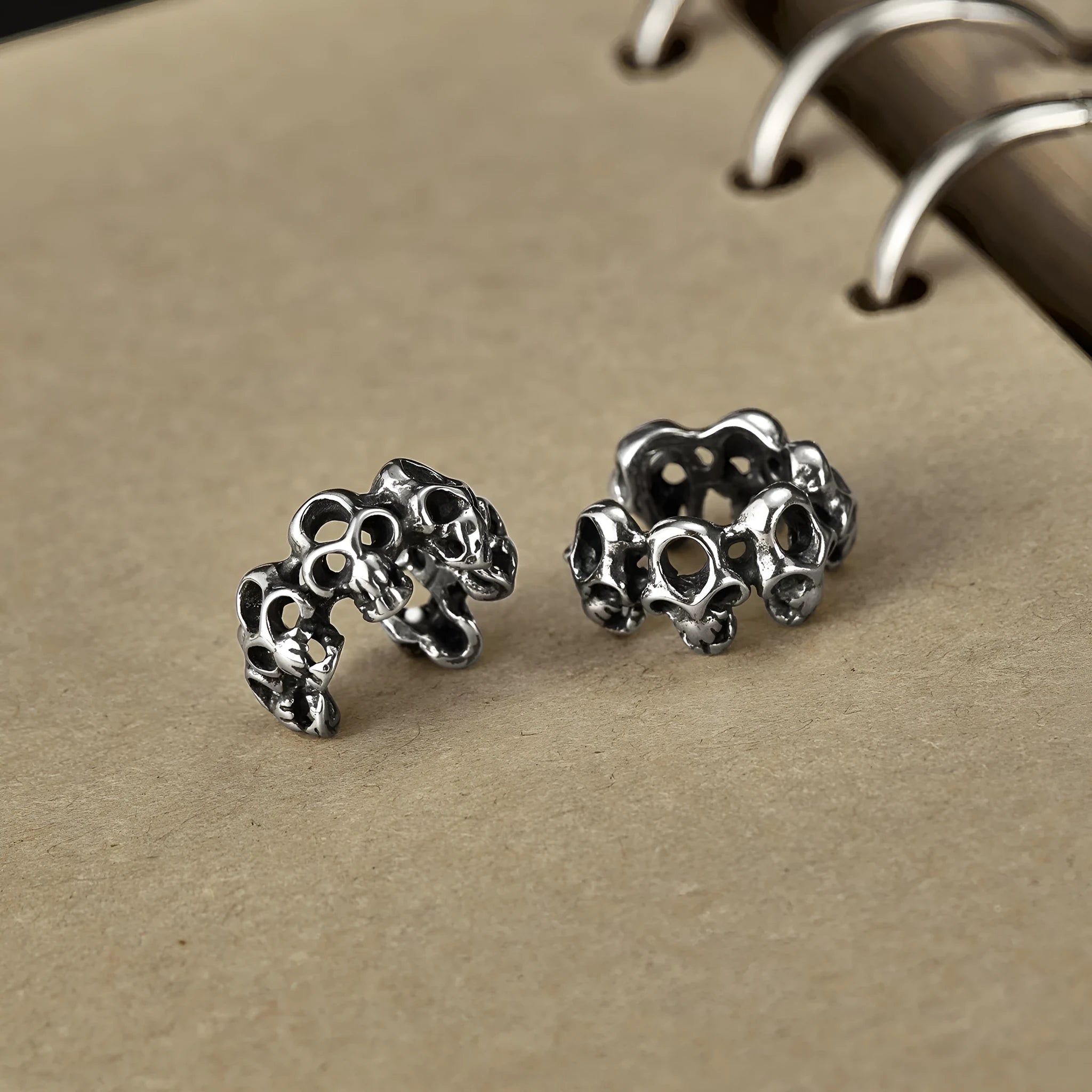 Retro hollow geometric skull earrings in stainless steel with ear clip fitting
