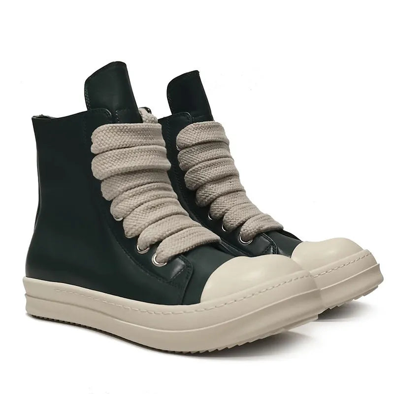 Genuine leather high-top sneakers with side zipper in black, shown on a casual outfit.