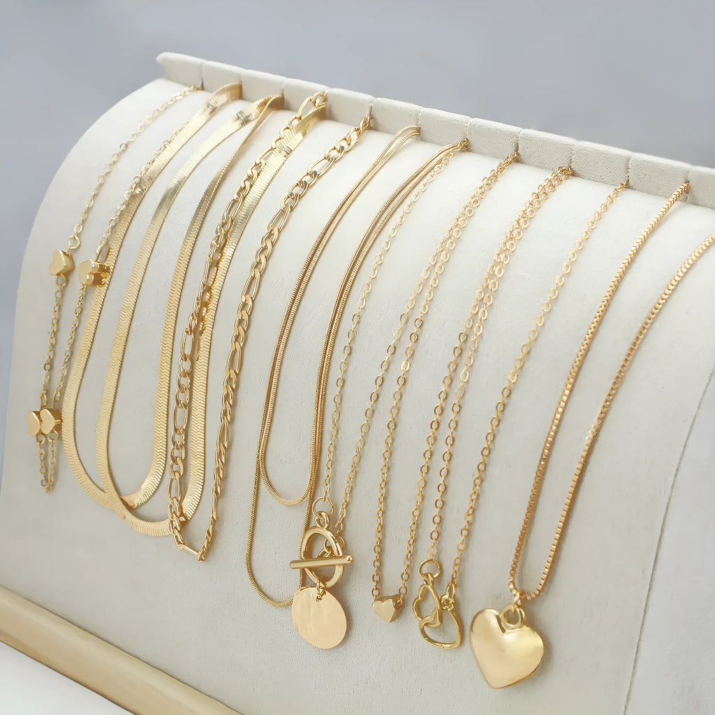10-piece gold electroplated women's necklace set with adjustable length and snake bone chain design