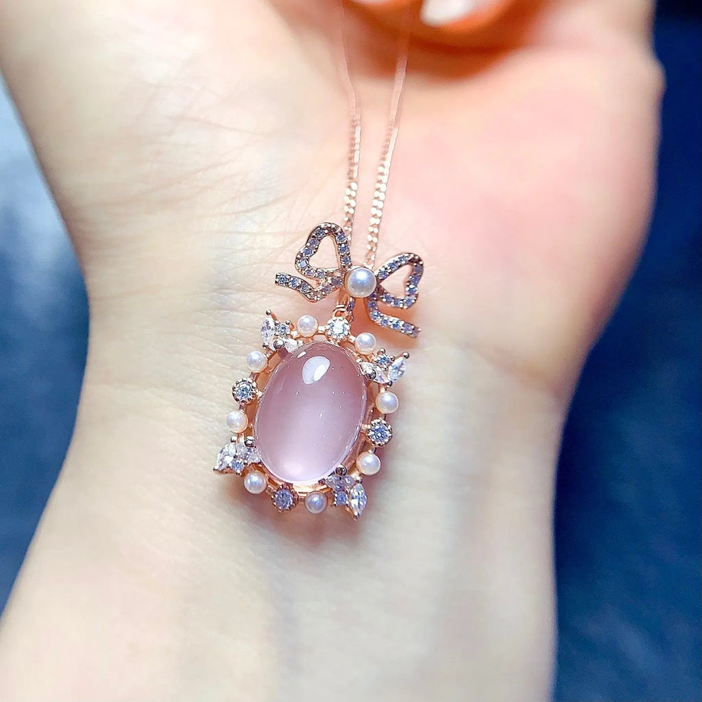 Geometric rose quartz pendant necklace in rose gold plated silver on a chain