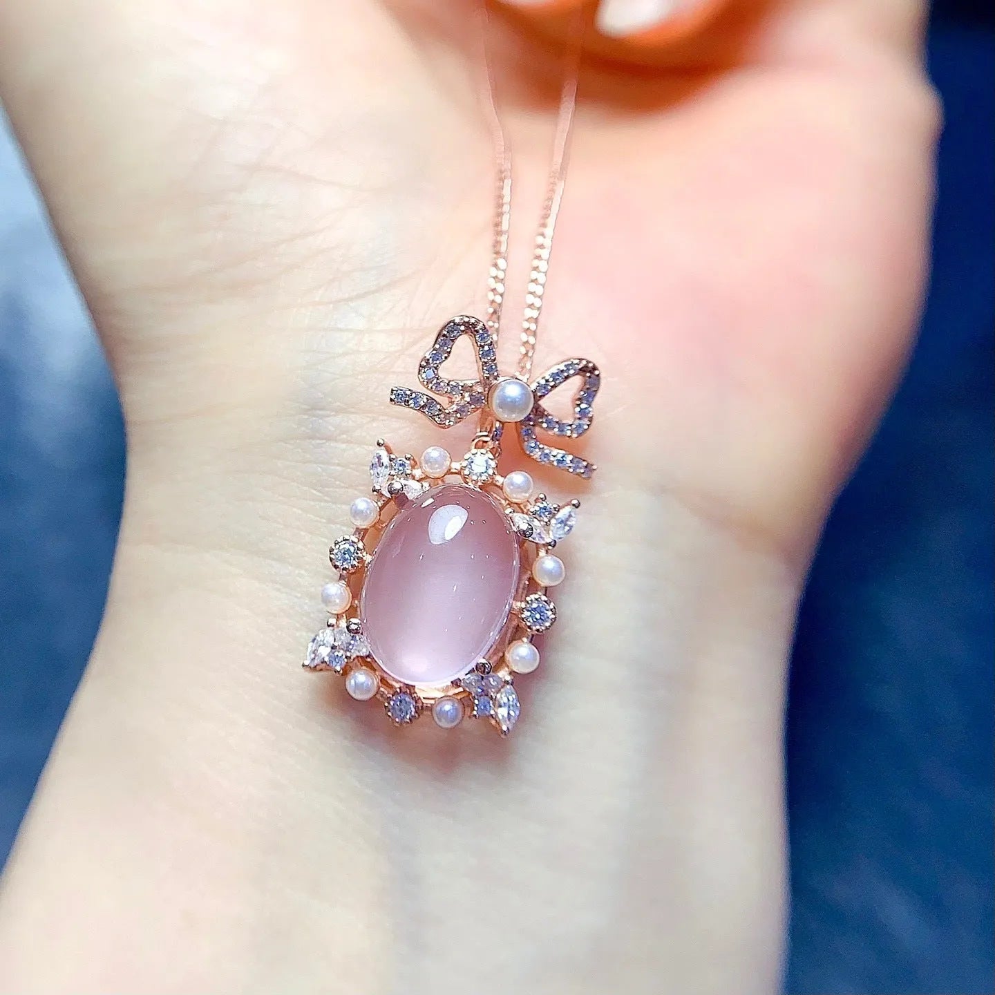 Geometric rose quartz pendant necklace in rose gold plated silver on a chain