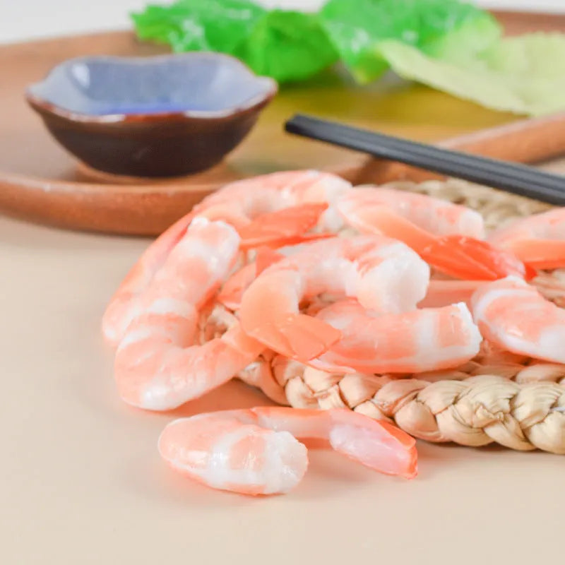 PVC injection moulded shrimp-shaped keychain with door buckle, 1.5cm thick.
