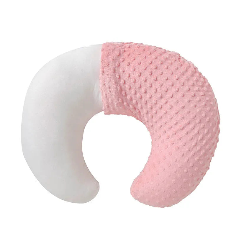 Nursing pillow with integrated spill barrier in a choice of pink, yellow, grey, or light blue colours.