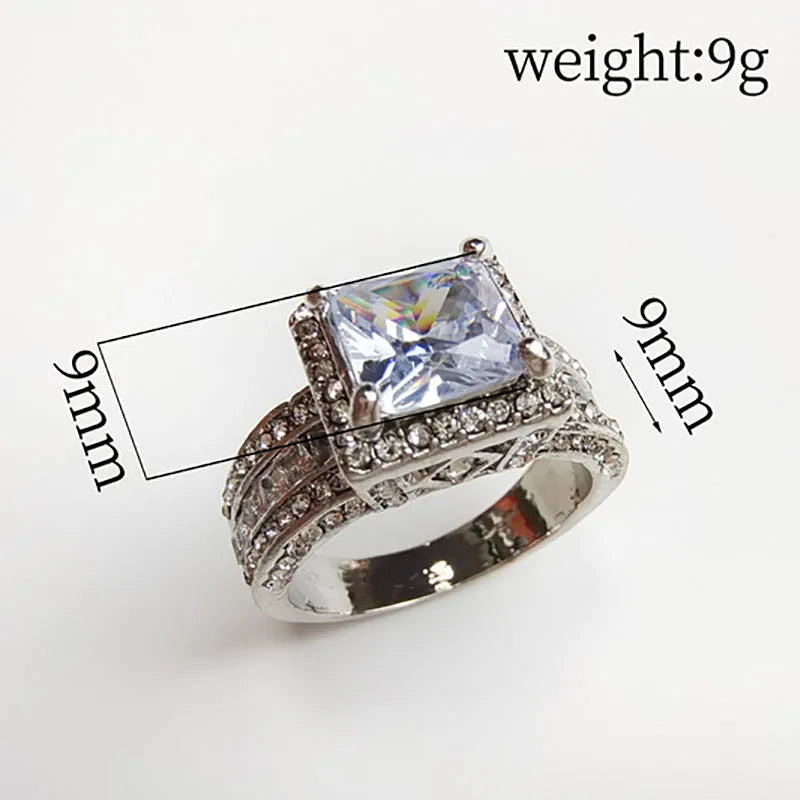 Geometric alloy fashion ring with round elements in gold or white electroplated finish
