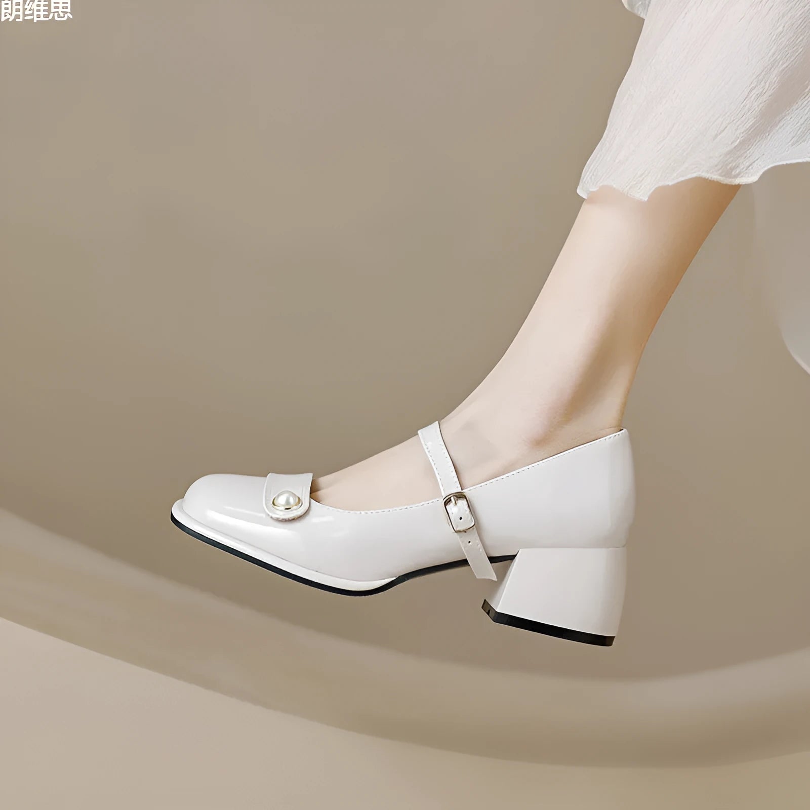 French-style chunky heel hiking pumps in patent leather with square toe and buckle