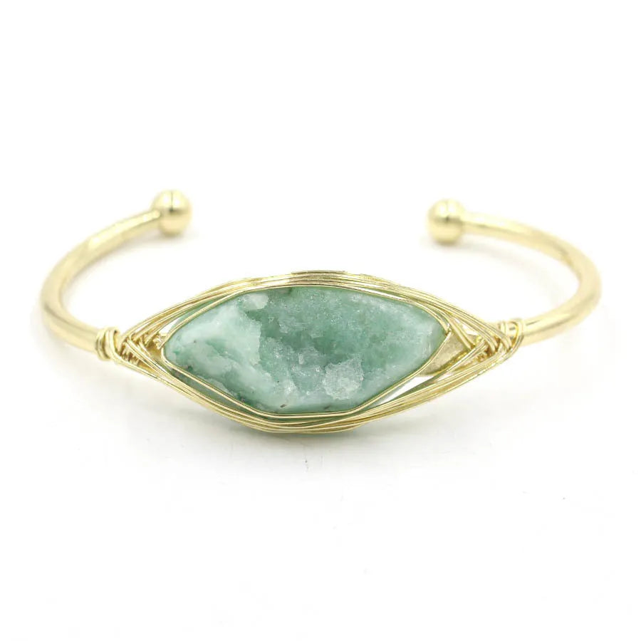 Natural raw gemstone bracelet with winding crystal design showing 8mm stones in various colours