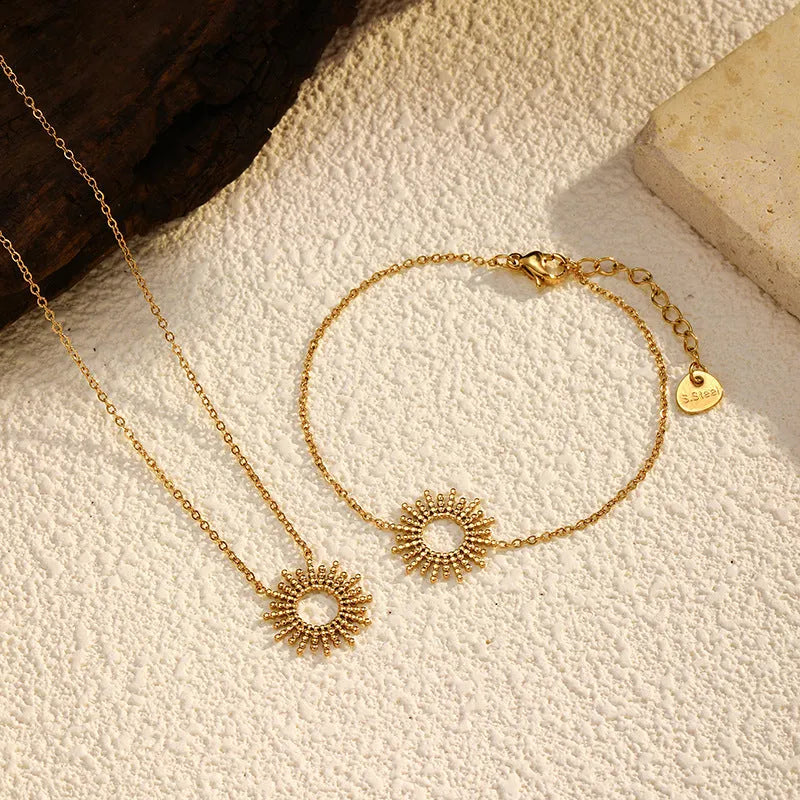 Sunflower Series women's gold-plated geometric chain necklace and bracelet set on a white background.