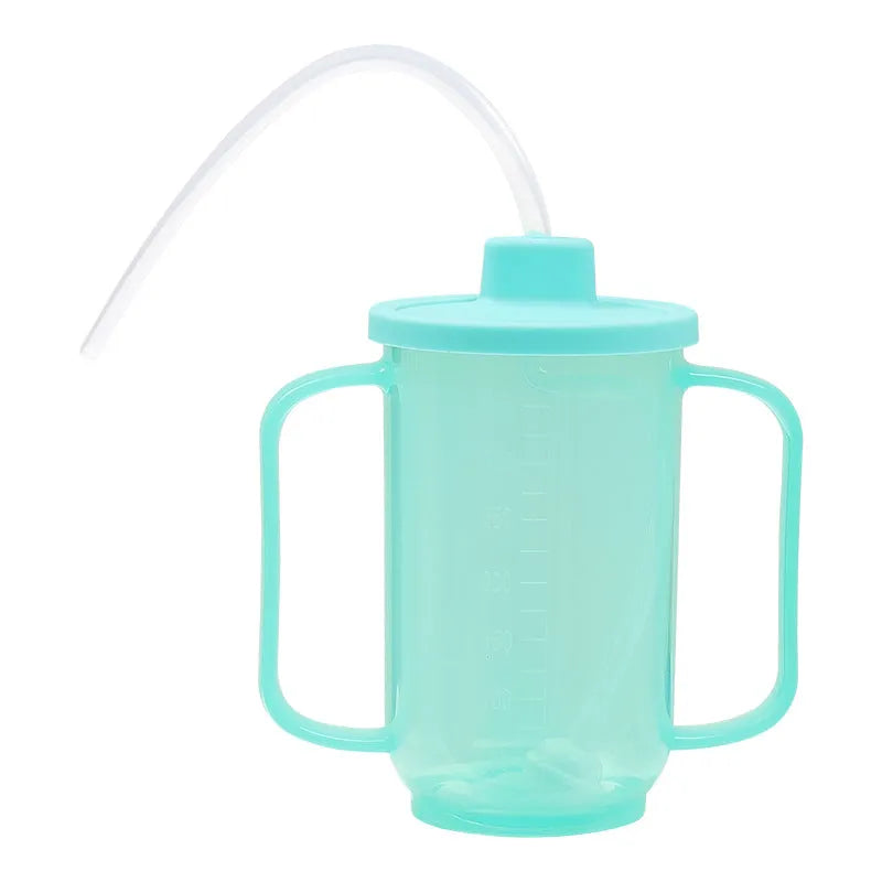 Oblique mouth choke-proof plastic drinking cup with handle and optional wrist splint for elderly adults.