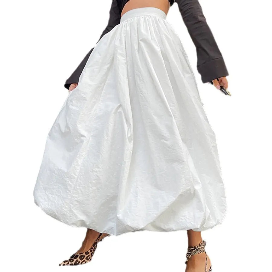 Women's cotton long skirt in solid white colour showing front view and length