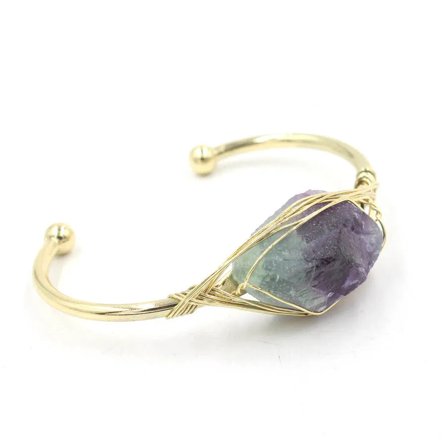 Natural raw gemstone bracelet with winding crystal design showing 8mm stones in various colours