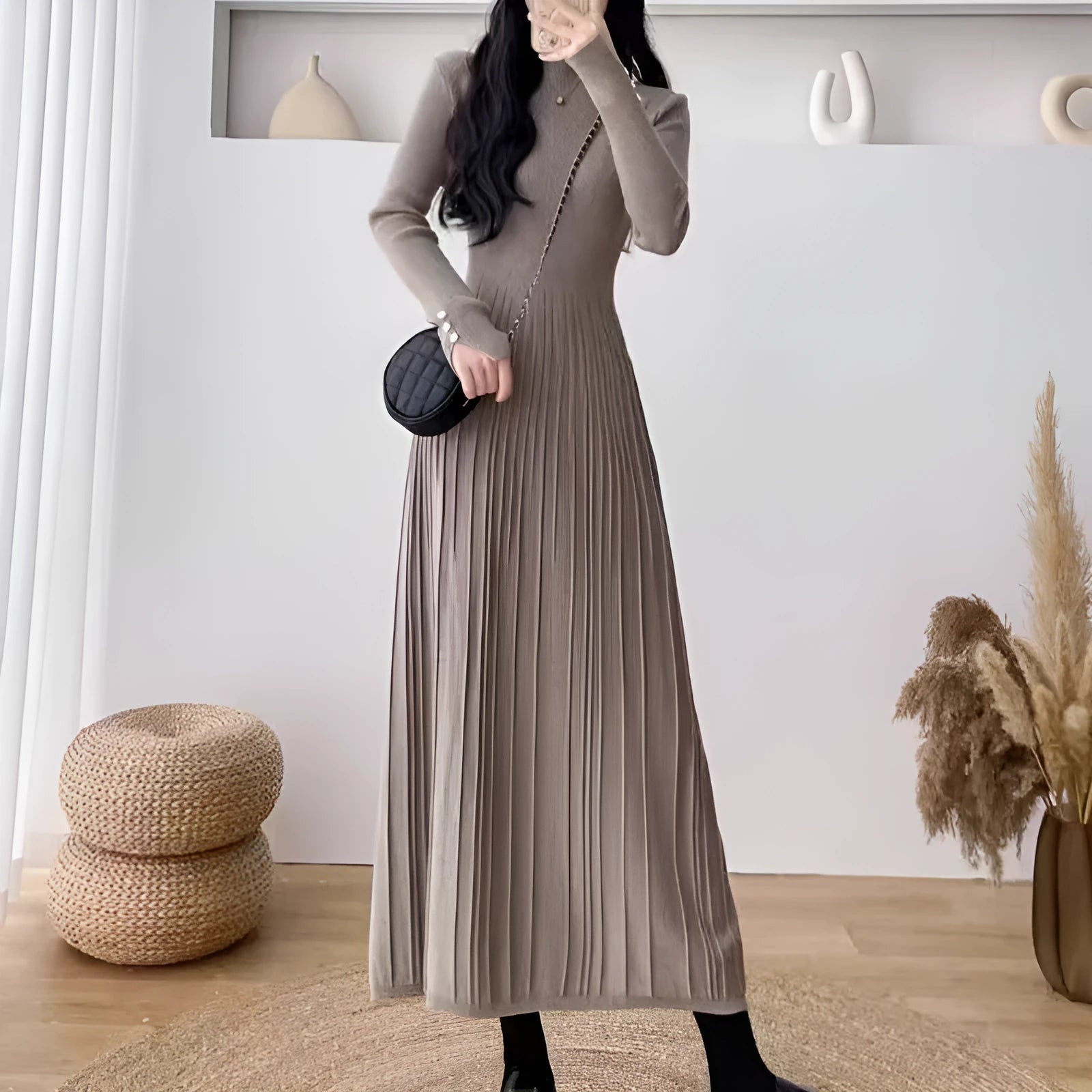 A women's solid colour A-line woollen skirt with a high waist, shown in a mid-length below-the-knee cut.