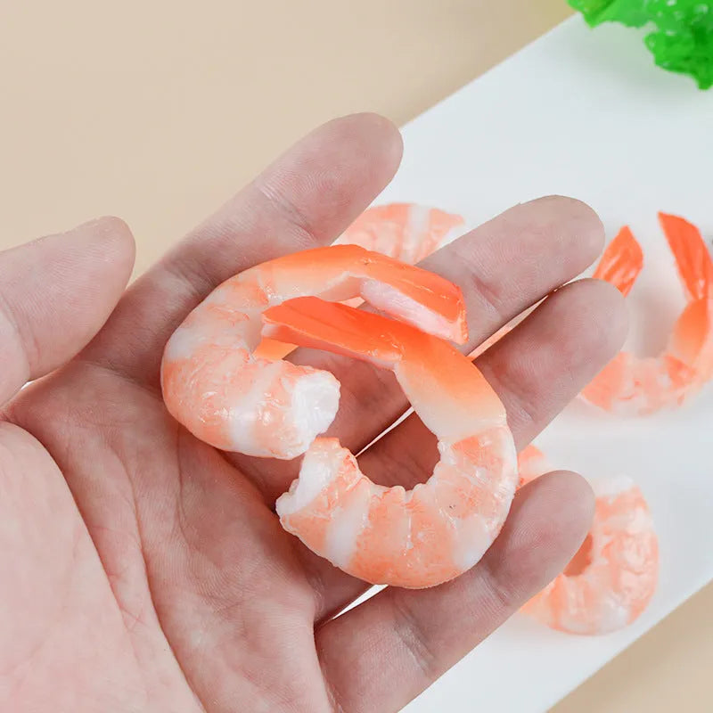 PVC injection moulded shrimp-shaped keychain with door buckle, 1.5cm thick.
