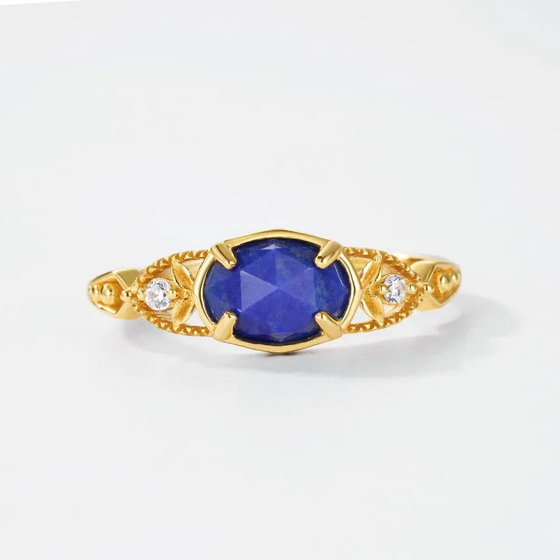 Women's silver geometric ring with blue lapis lazuli stone in ellipse shape