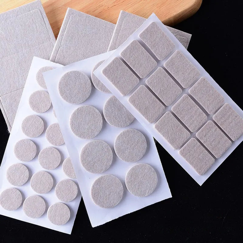 Beige plastic furniture protection pads in multiple sizes including round and square shapes