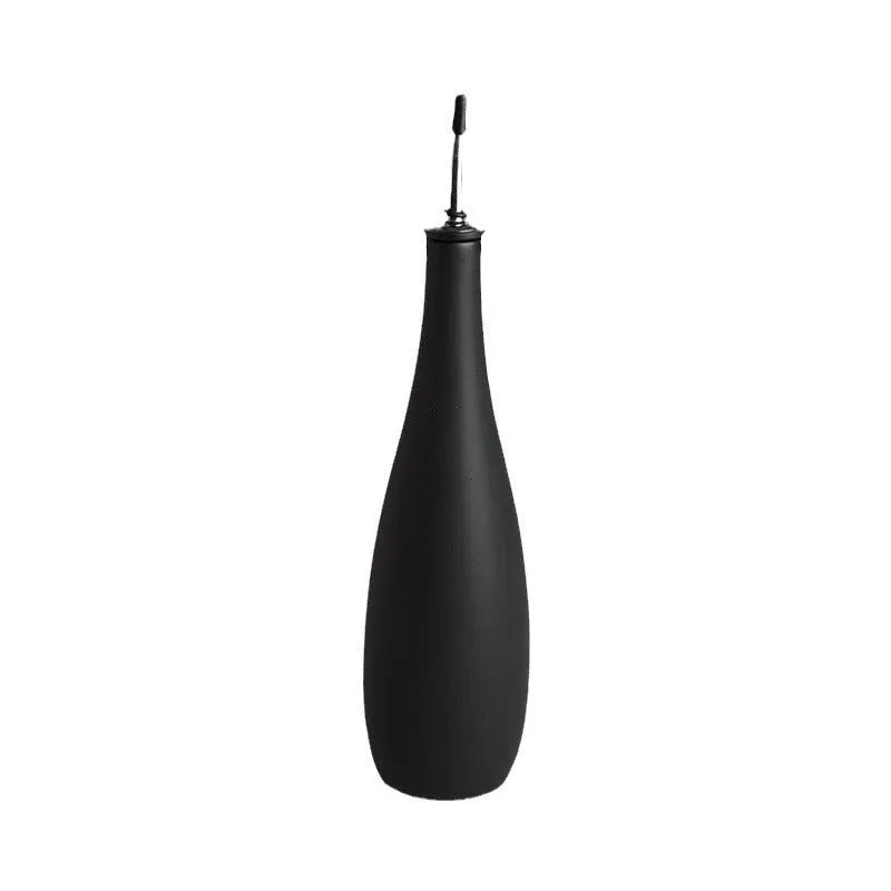Ceramic oil pot with stainless steel funnel in black, coffee brown, or white finish.