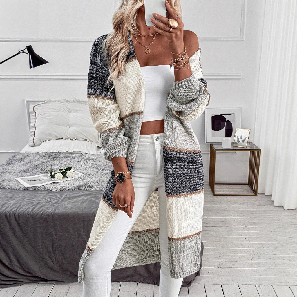Grey women's knitted cardigan with striped or plaid pattern, loose fit with long sleeves